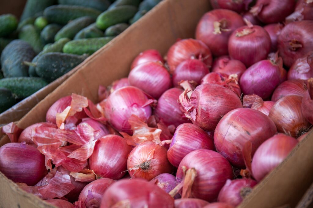 red onions at market