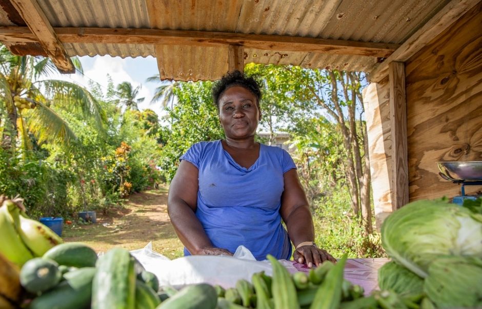 A female farmer selling her produce